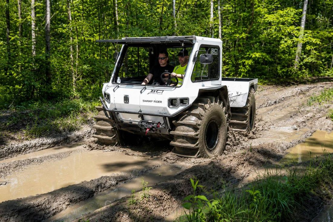 Swamp Rider paddle tires crossing deep bog mud