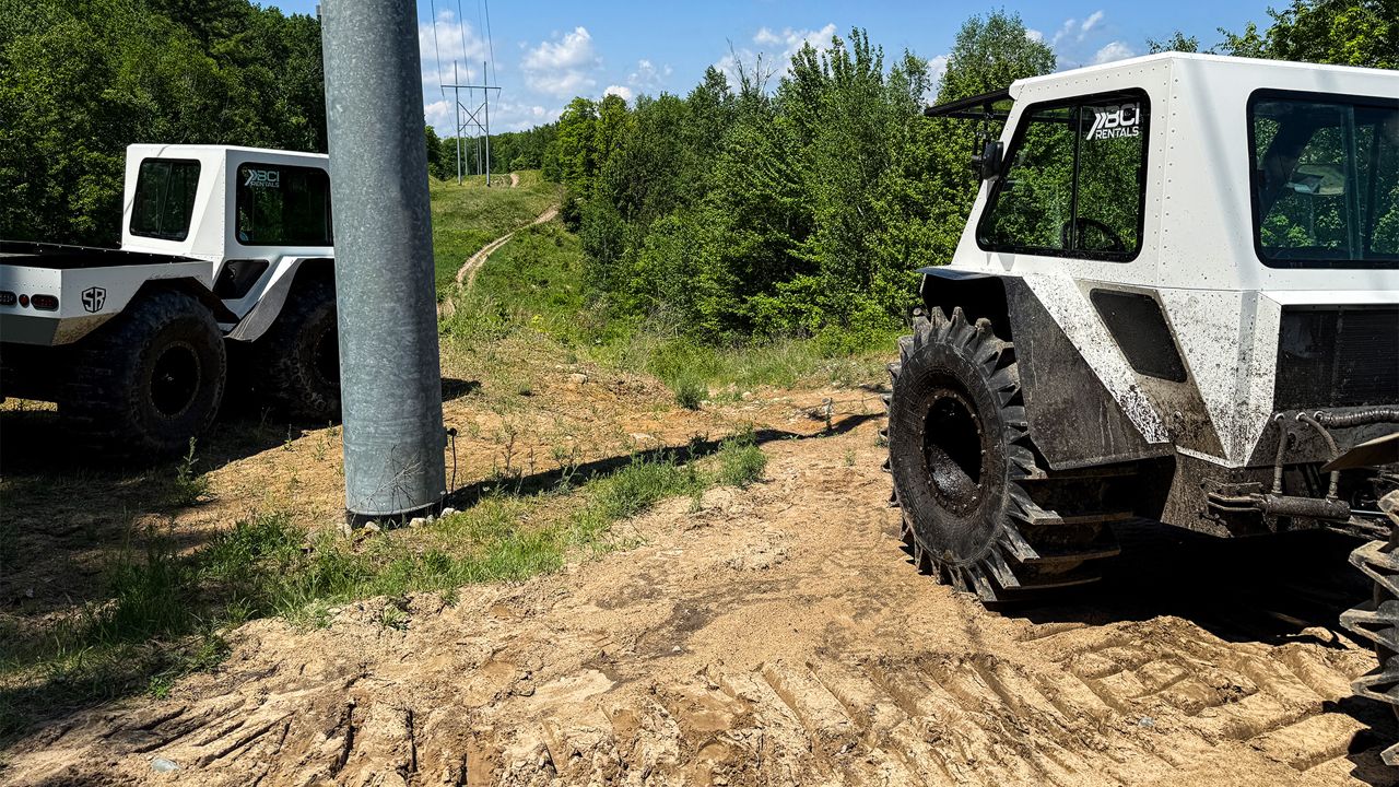 Swamp Rider amphibious UTV on a powerline right-of-way, available for commercial rental from BCI Rentals in Backus, Minnesota