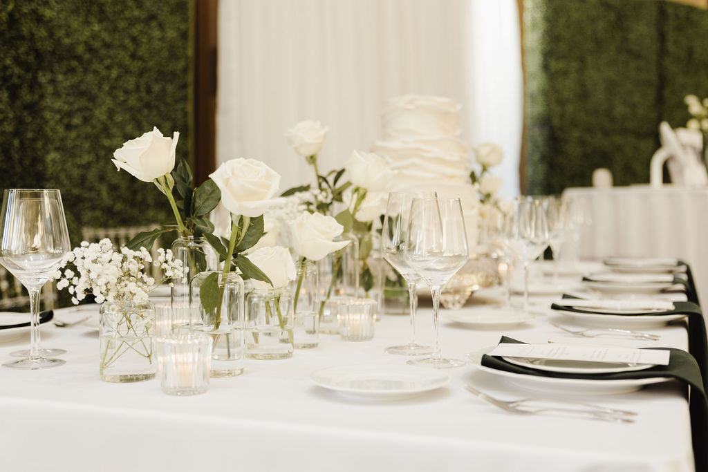 Elegant table setting with glassware and event rentals
