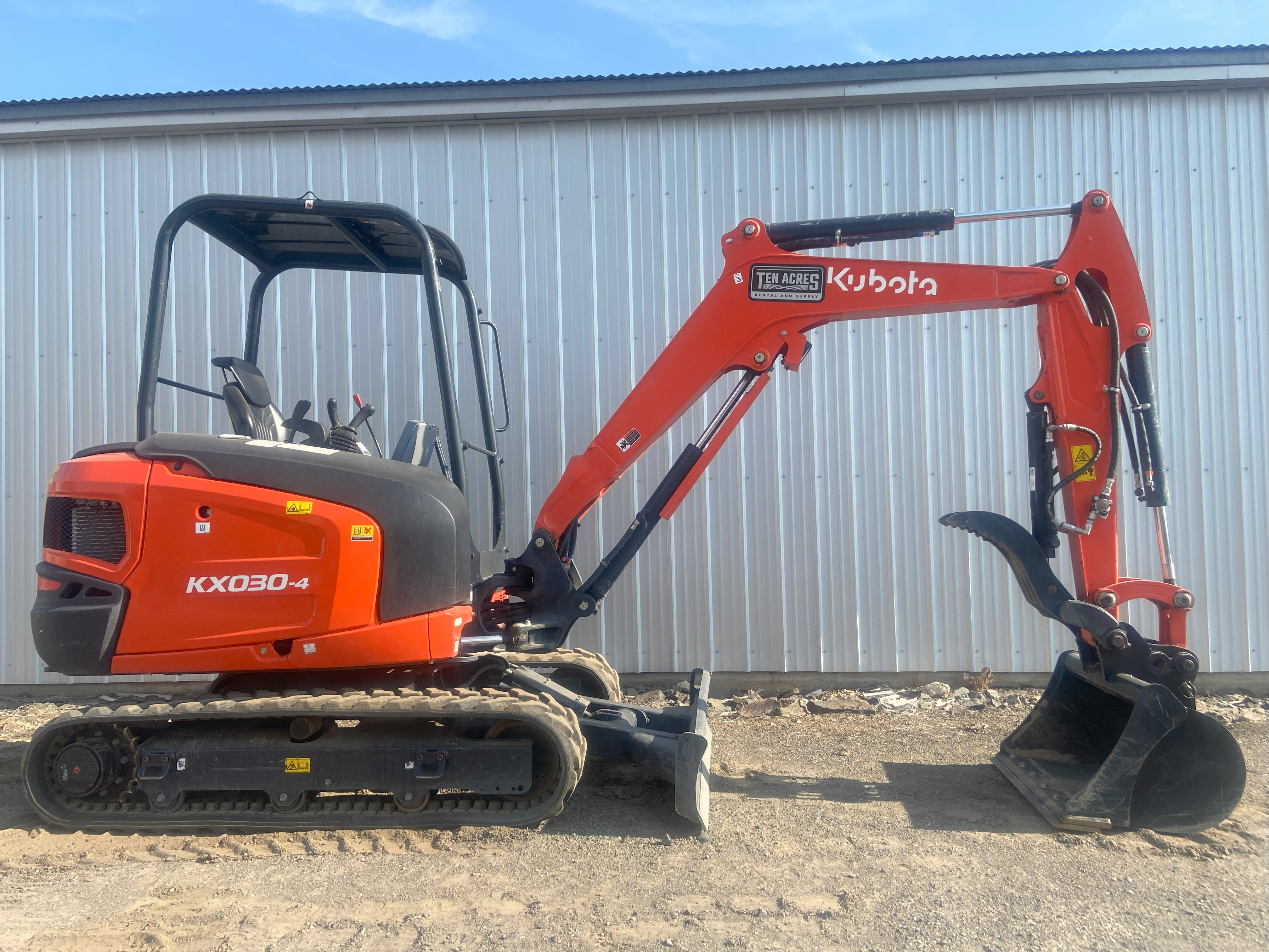 Rent the Kubota KX030-4R1 6K Mini Excavator w/ Blade & Thumb